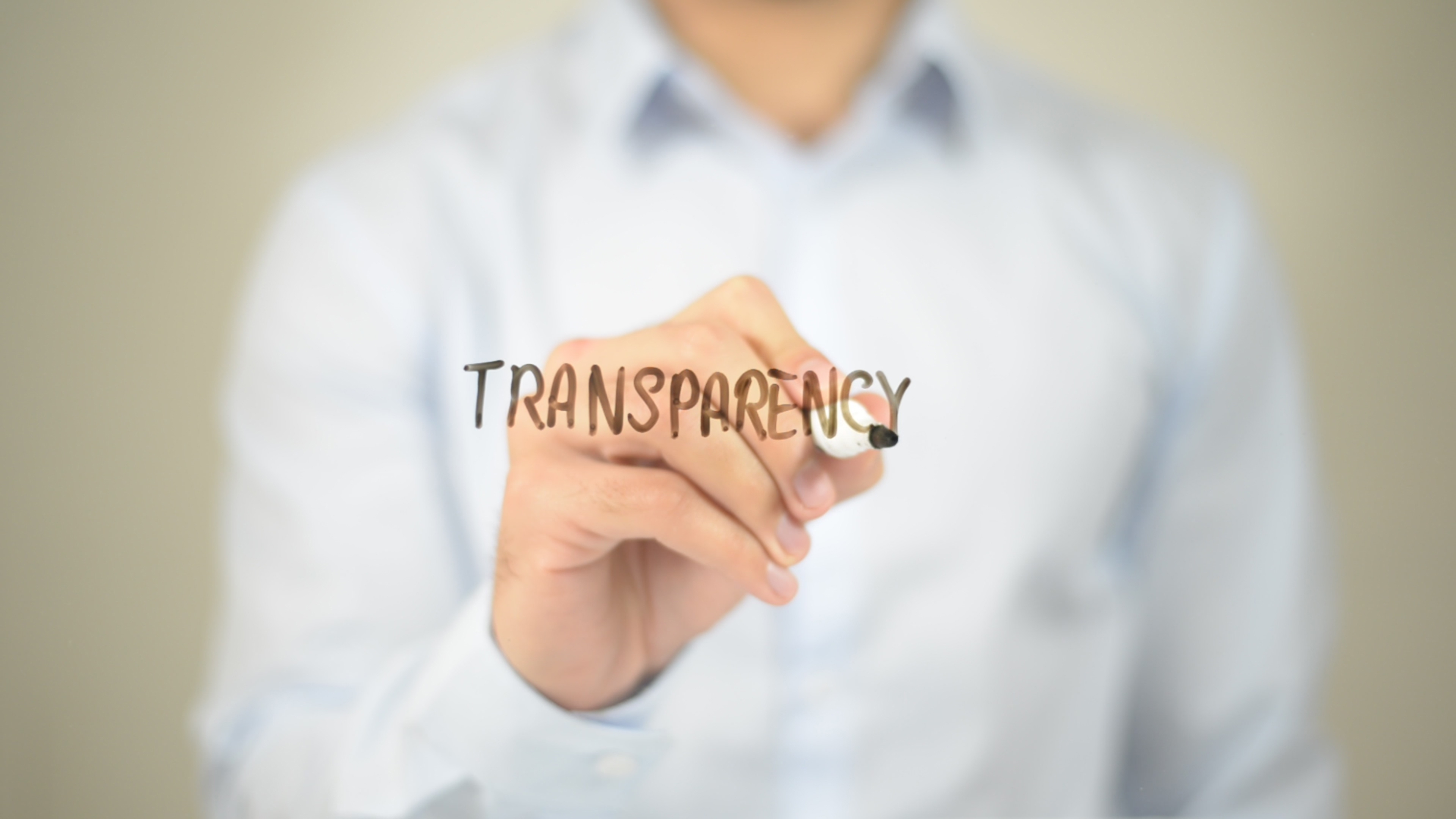 man writing transparent